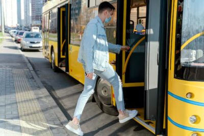 Man taking a bus