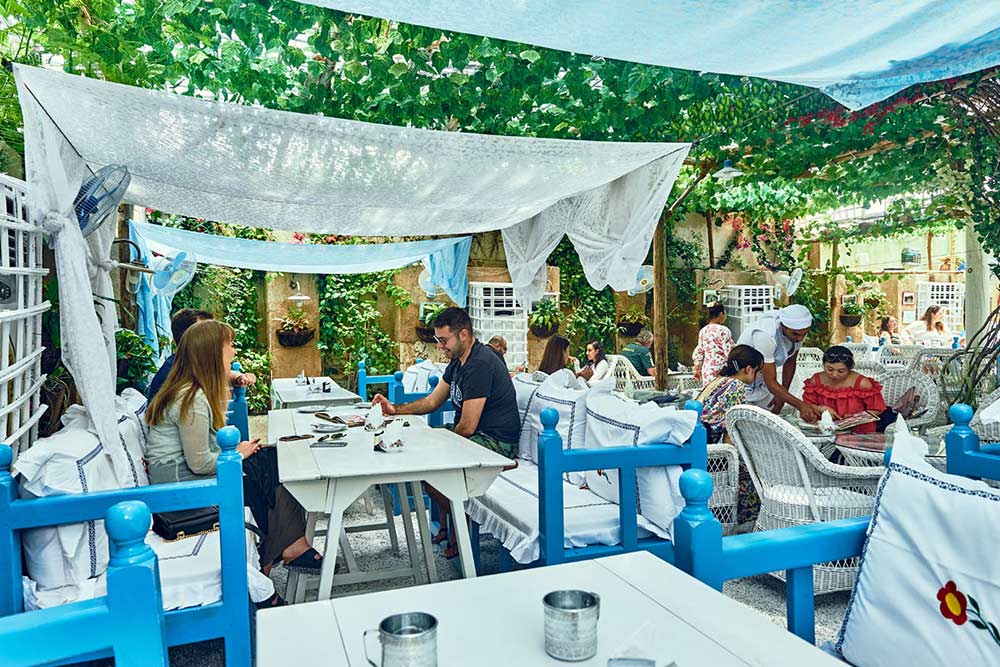 Blue and white chairs in a restaurant 