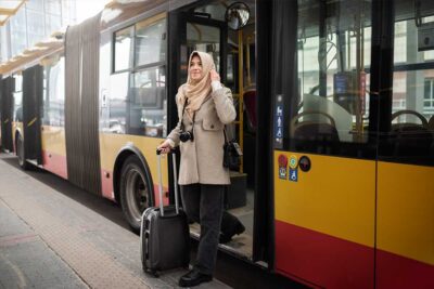 women commuting in Dubai buses