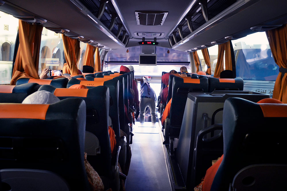 Comfortable seating inside the Sharjah to Oman bus