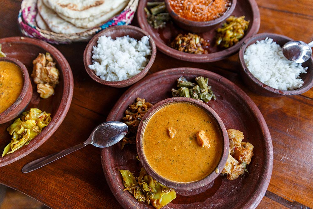 Rice with some gravy and vegetables in a kerala restaurant