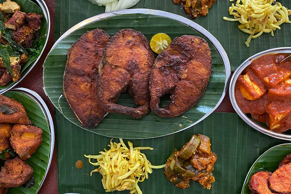 Fried Fish with some side dishes at kerala restaurants