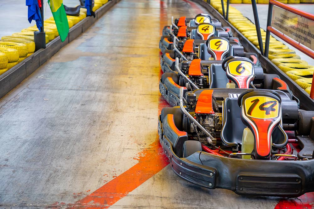 Parked cars in a go-karting spot