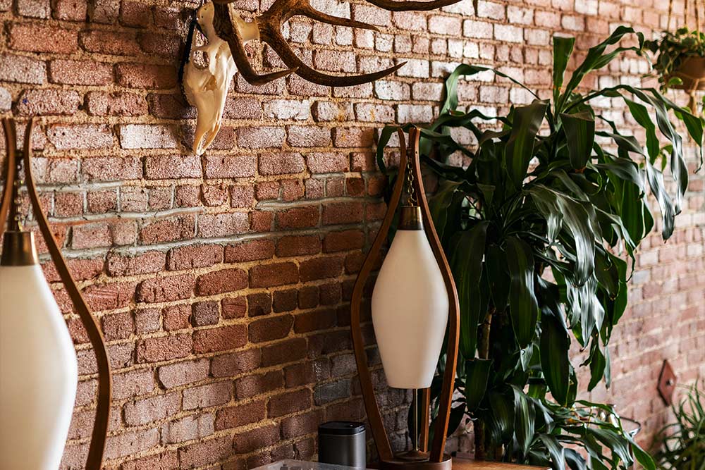 A well decorated industrial loft with metal cupboard and shelves