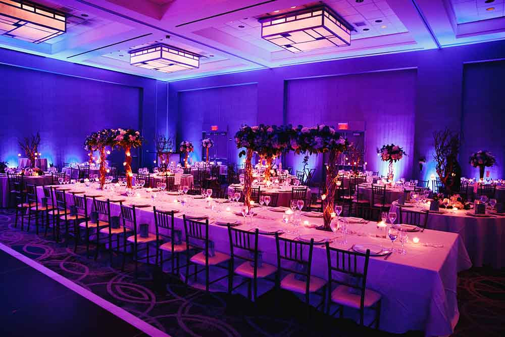 A well decorated wedding venue with flowers