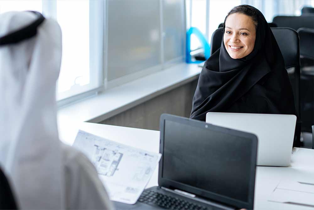 A female employee having a meeting with client