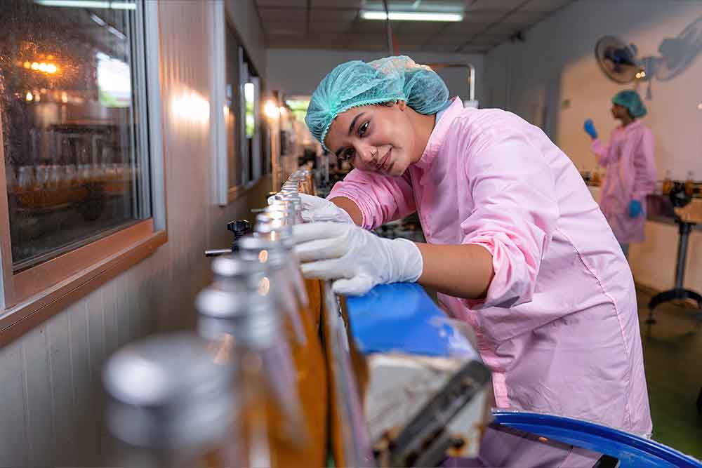 An intern working happily in production department