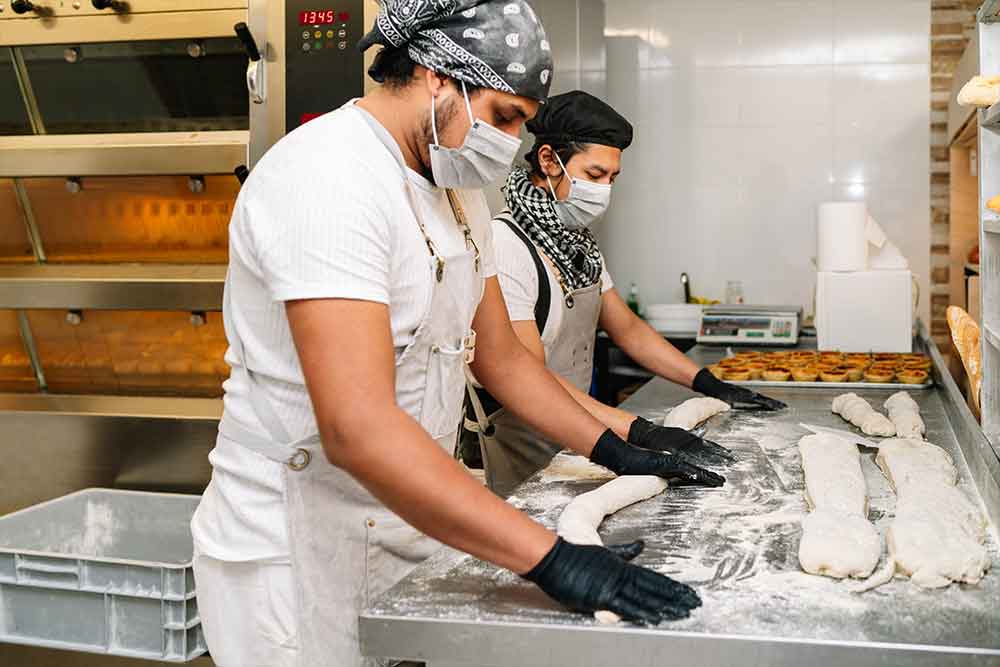 Bakers working in a bakery