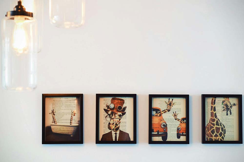 Four paintings on a home wall for decor