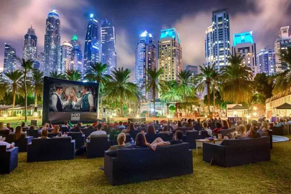 Outdoor cinema in Dubai with the skyline in the background