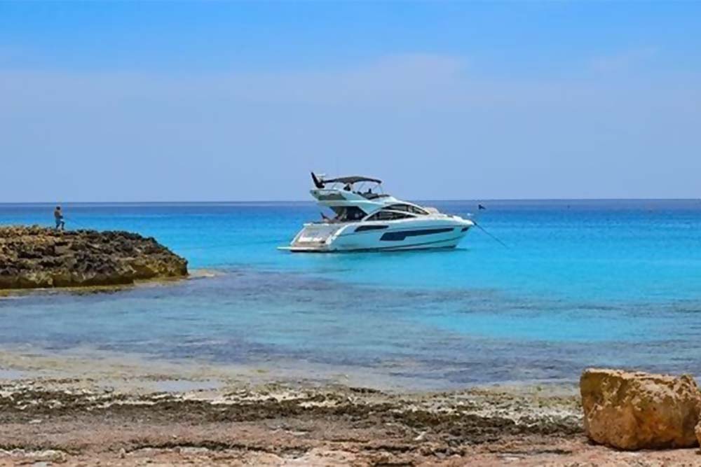 speeding around blue waters with royal blue coast yachts