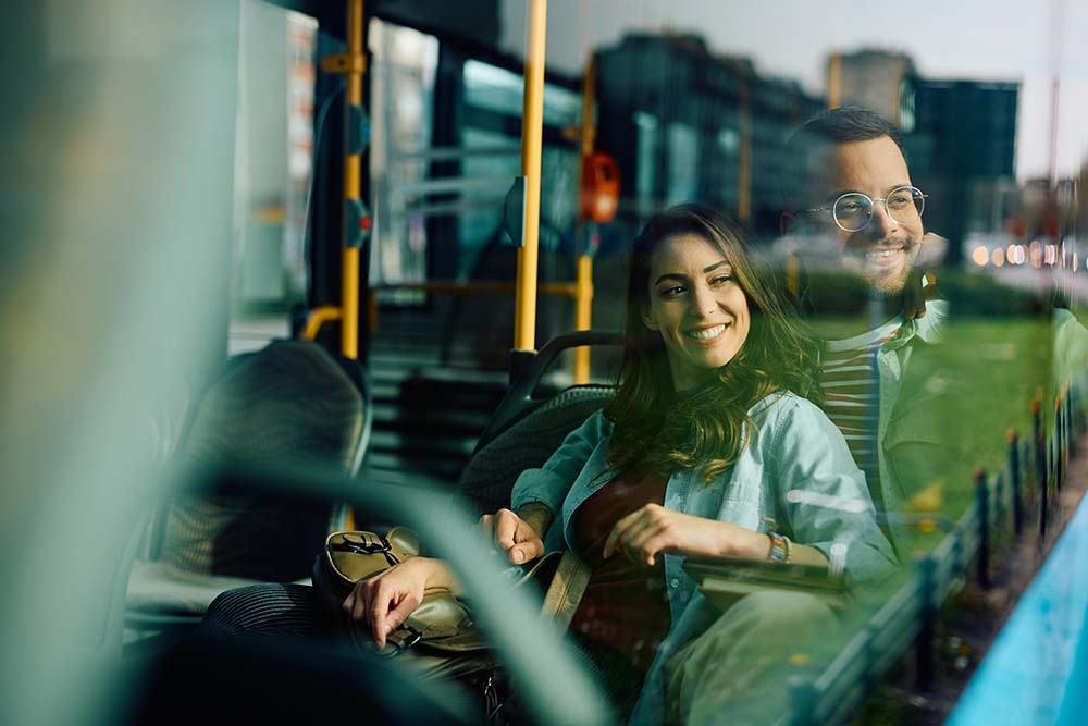 Couple travelling in intercity RAK Bus