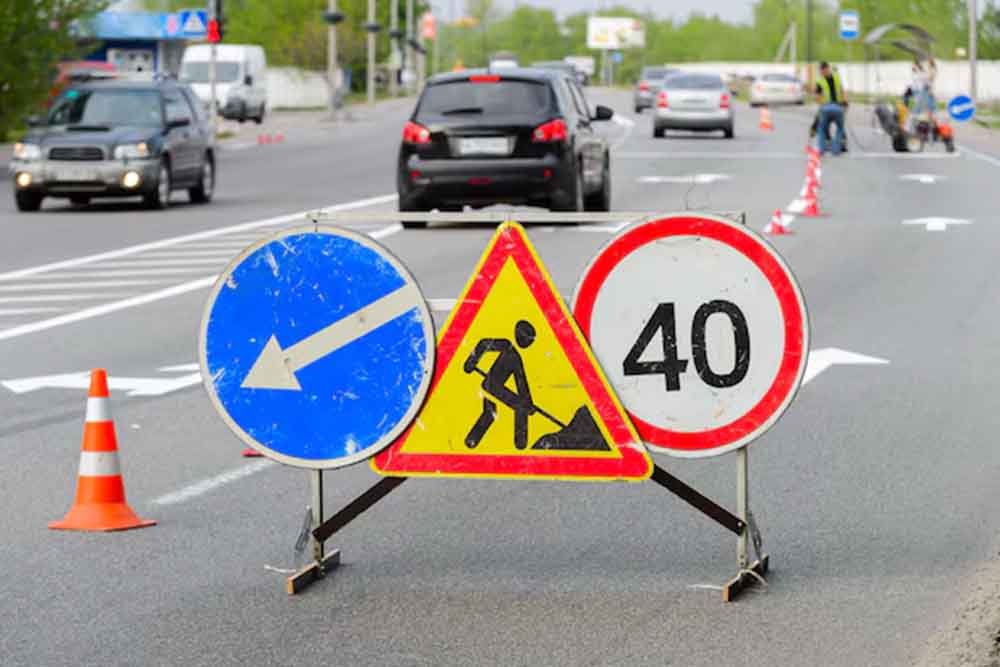 Road sign of speed limit and construction