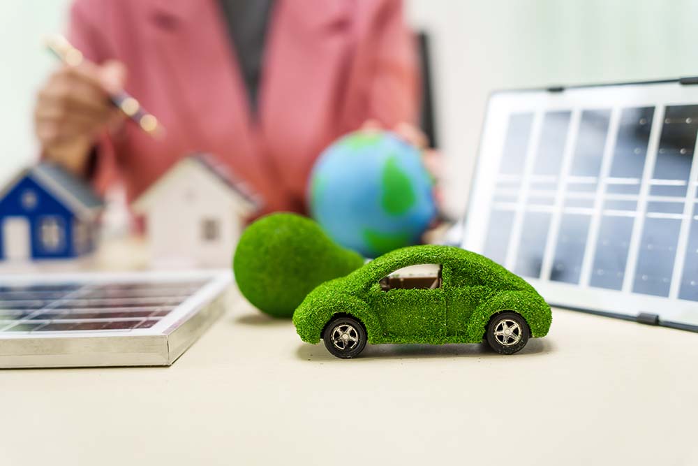 Green car showing sustainability and eco-friendliness