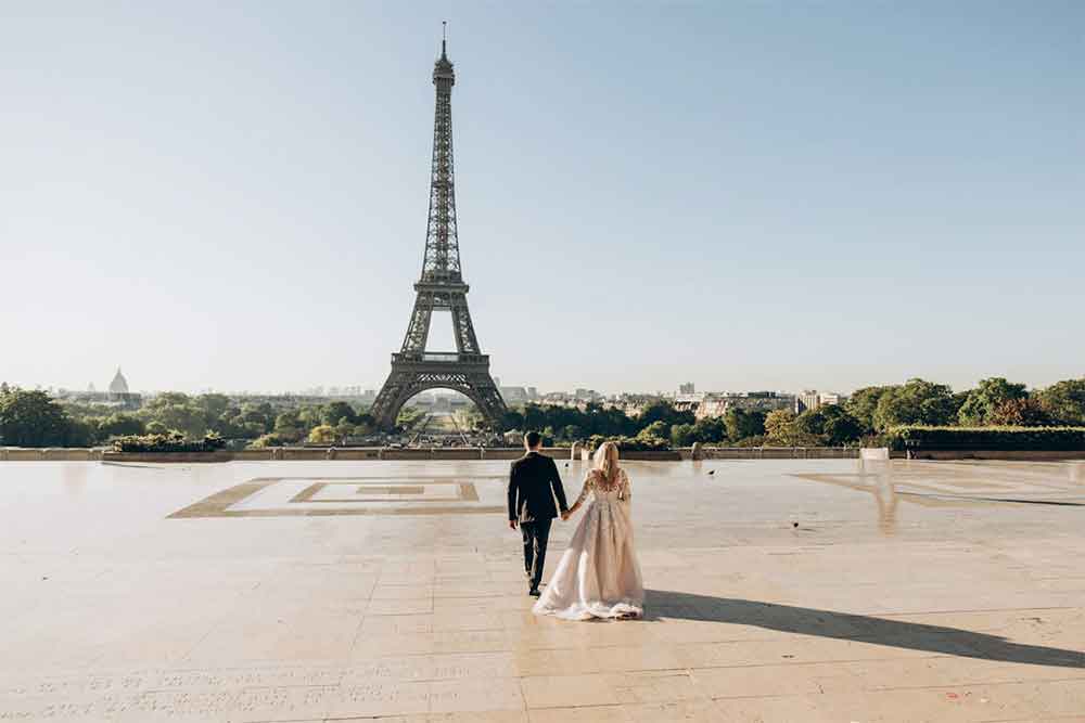 A view of Eiffel Tower with a couple