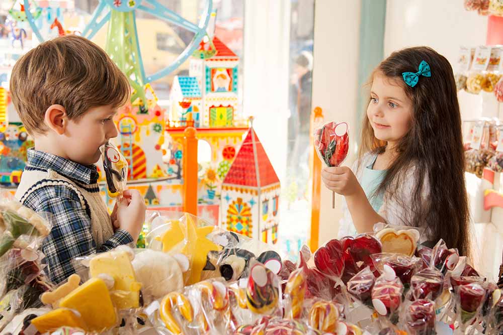 Kids enjoying candies and toys in Dubai 