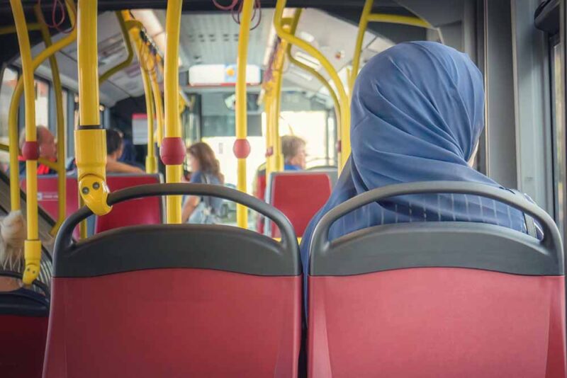 Woman travelling in RAK Bus