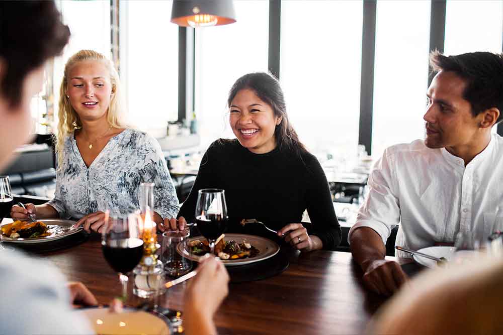 Group of friends dining at a restaurant 