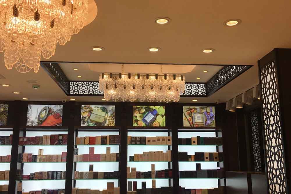 shopping for perfumes at mayora khamas store perfume shop in dubai (image source mayora khamas facebook page) 