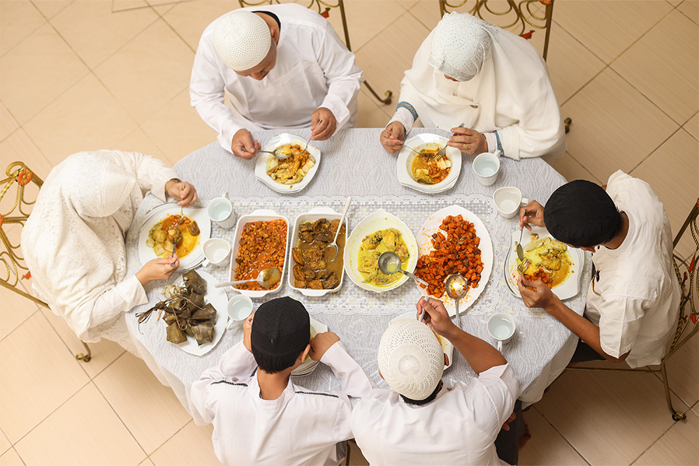 A family enjoying a meal at a Mandi Restaurant