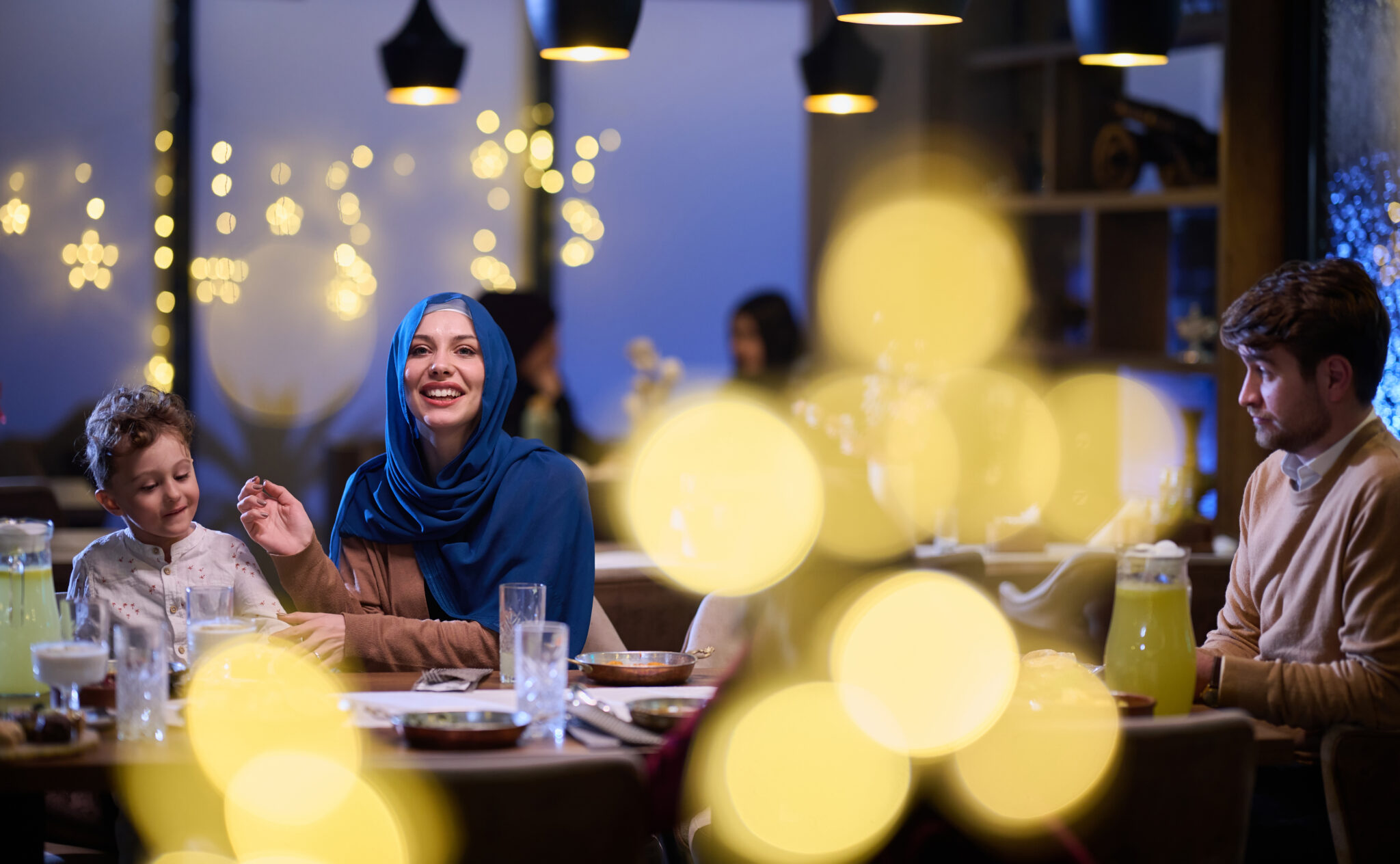 a family eating at the best restaurant in abu dhabi