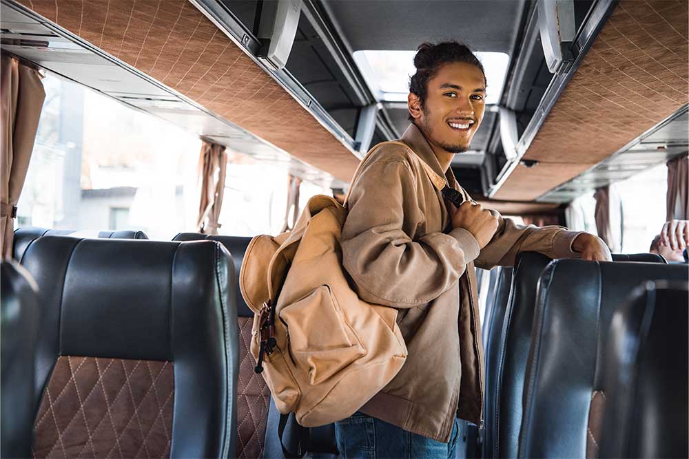 man travelling in Ajman to Sharjah bus