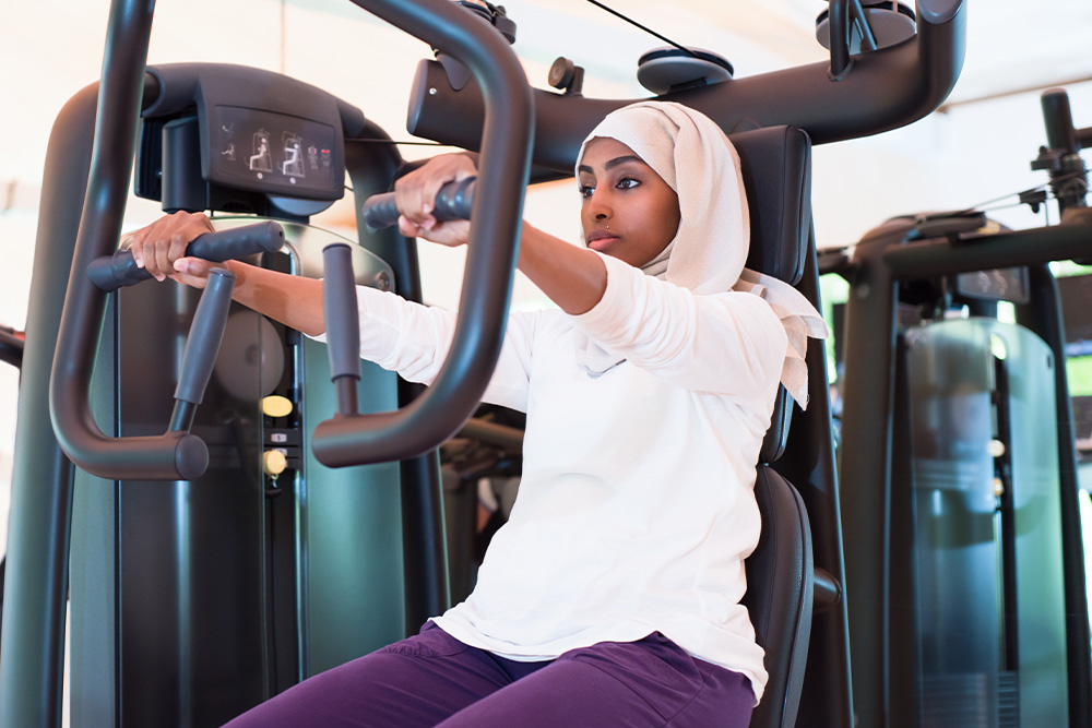 women using gym machine at ladies gym