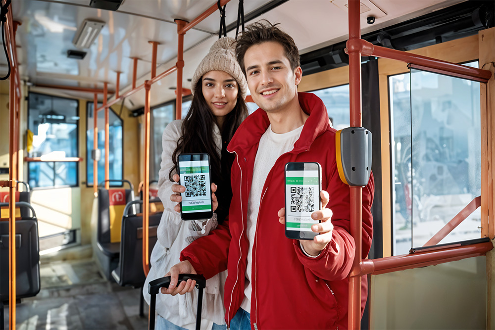 People showing QR code on a bus