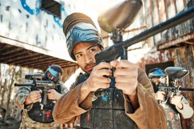 Team playing paintball in dubai