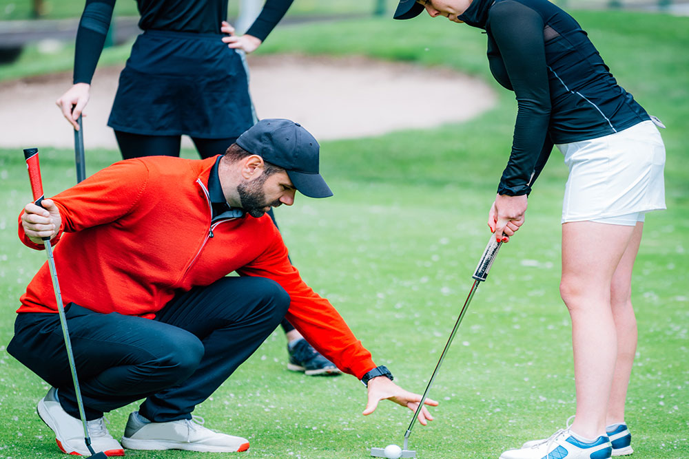 Learning to play golf at Dubai Golf Clubs