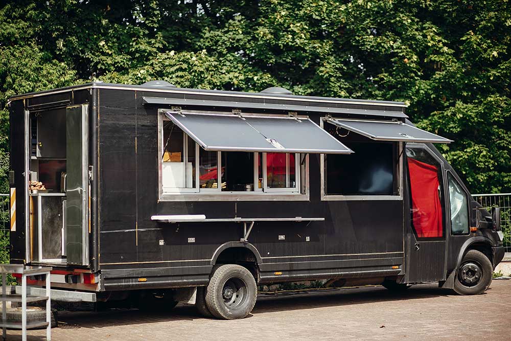 black food truck with burger