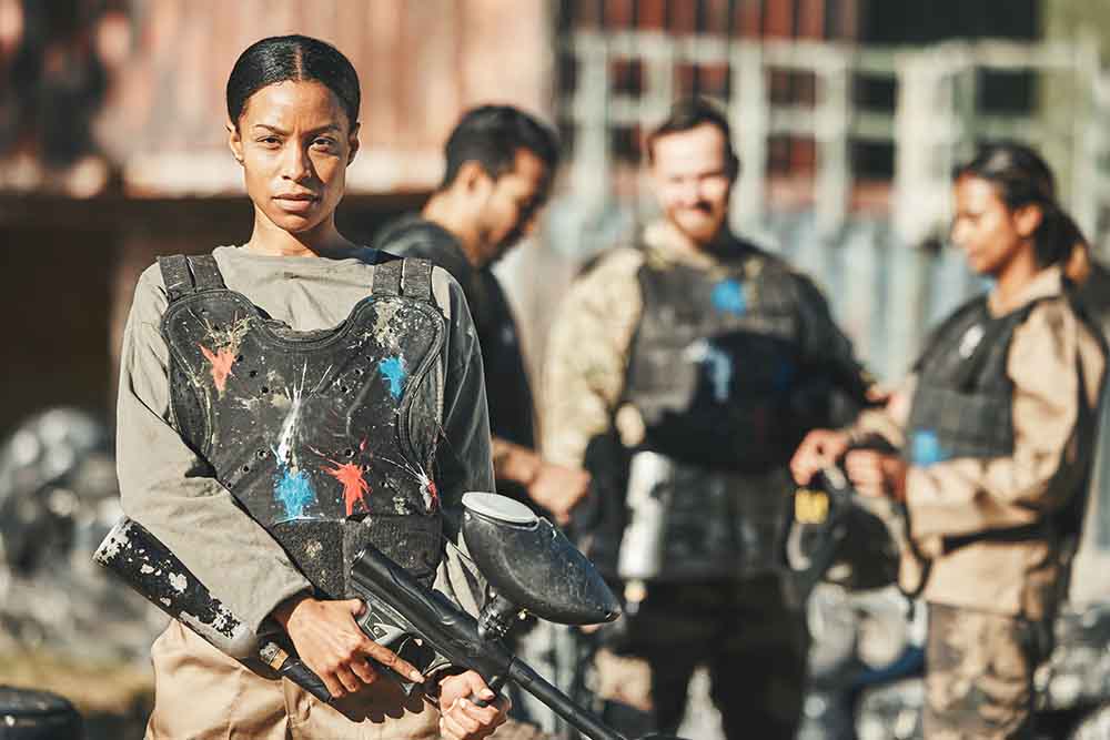 Woman playing paintball in Dubai