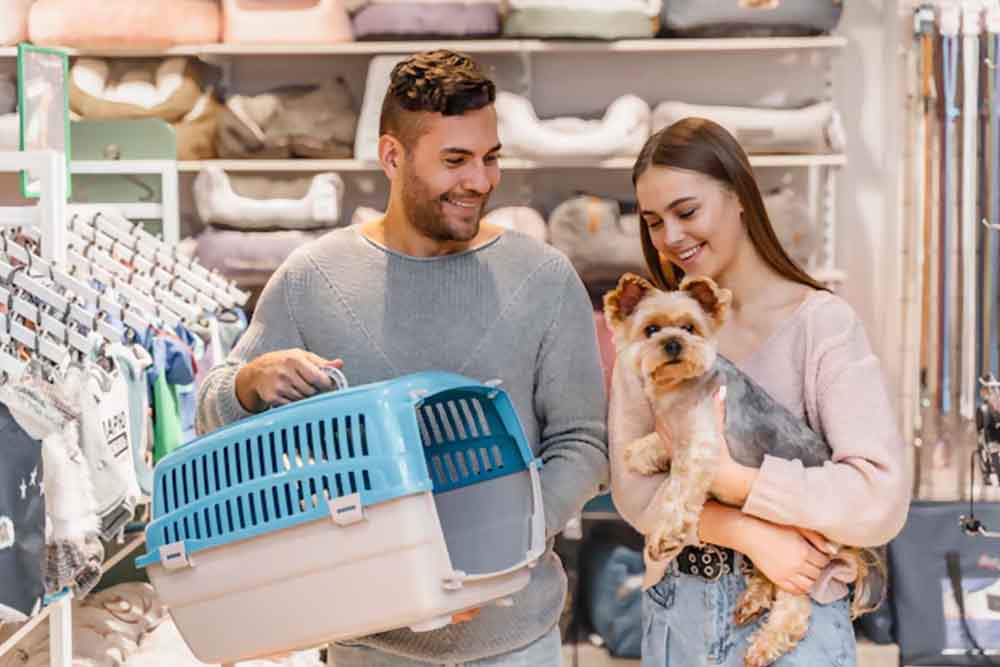 holding a pet and a cage