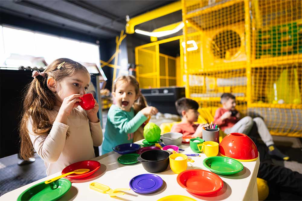 Kids playing kitchen role-play games 