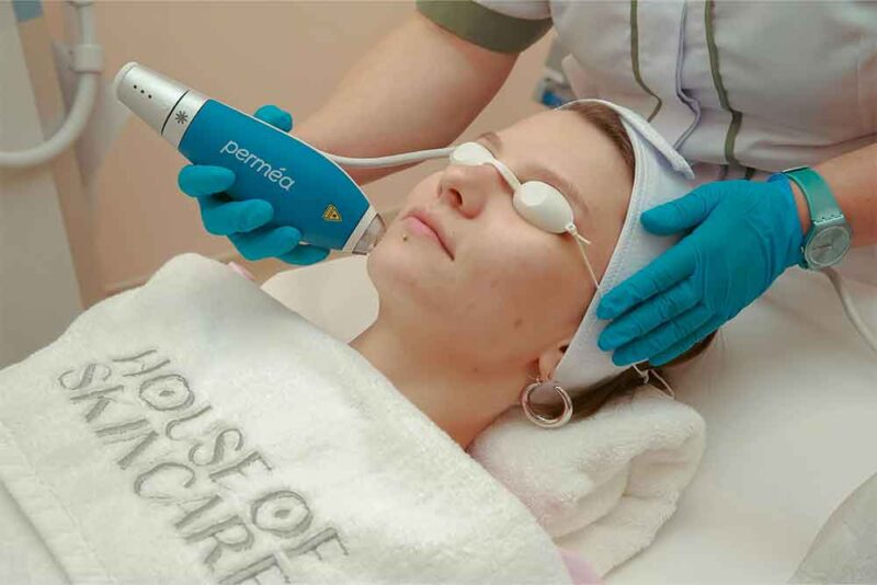 Female receiving facial treatment in Dubai