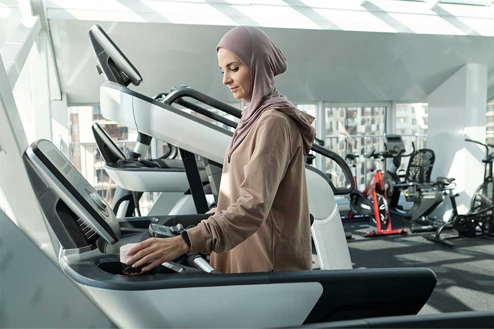 walking on a treadmill in gym