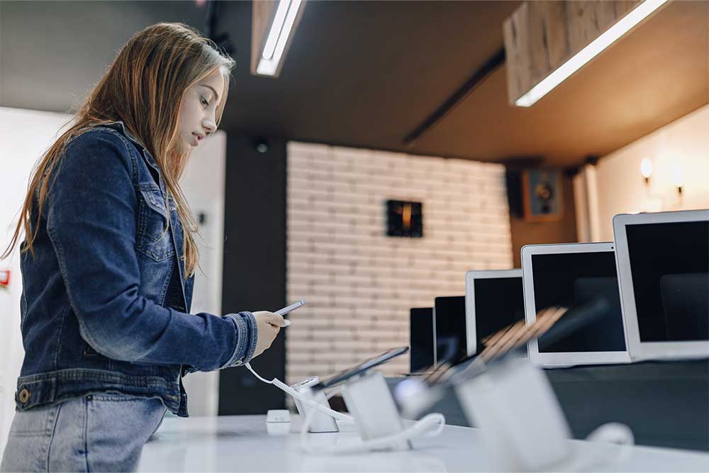 Girl in a mobile store