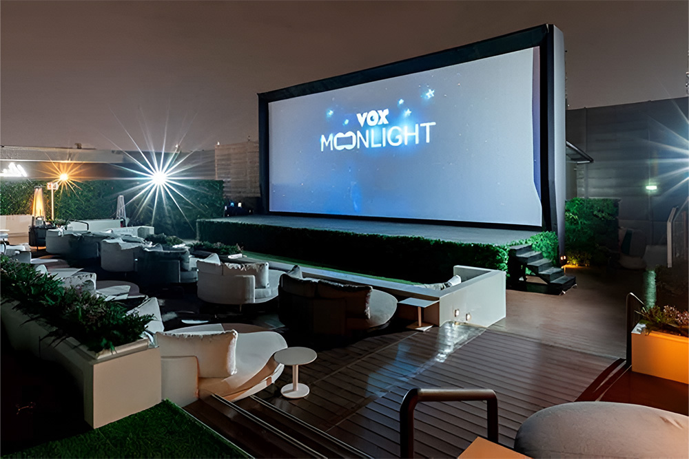 Outdoor cinema with white chairs