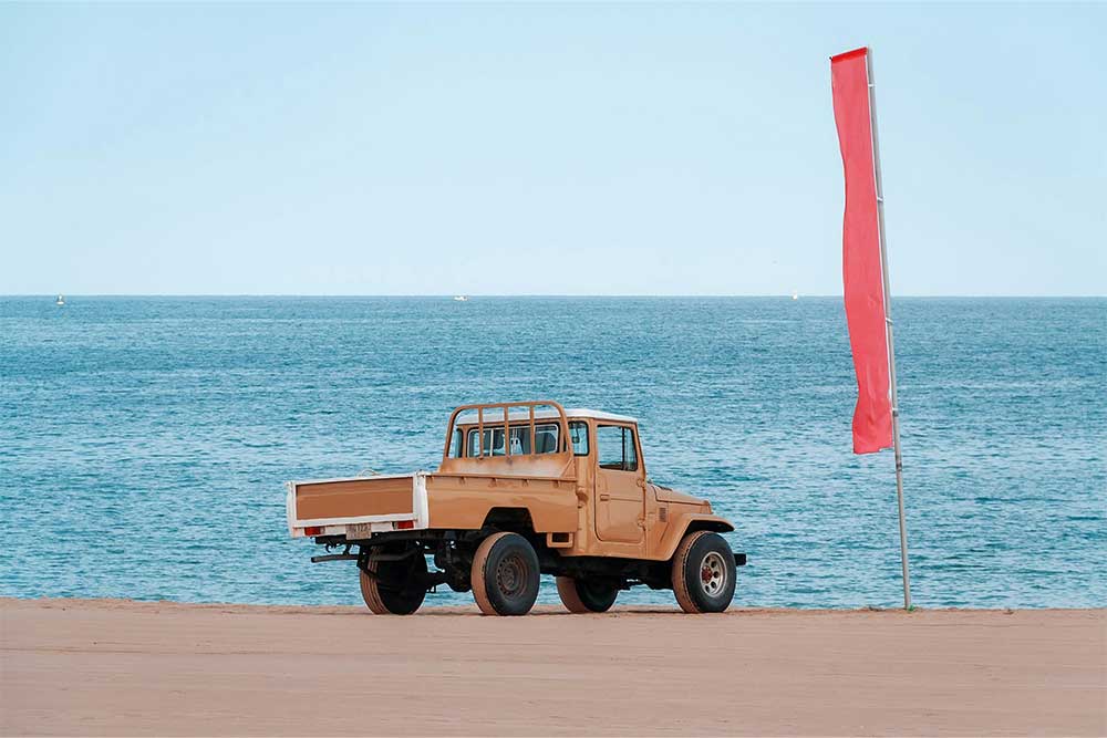 vintage truck on khorfakkan beach in sharjah 