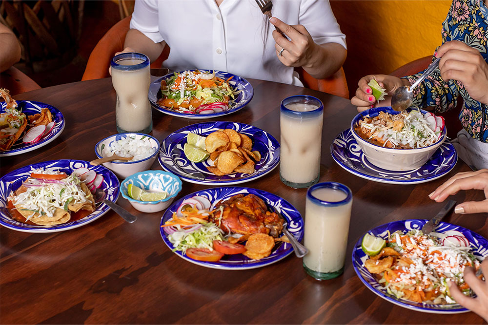 A family having Mexican food in a restaurant