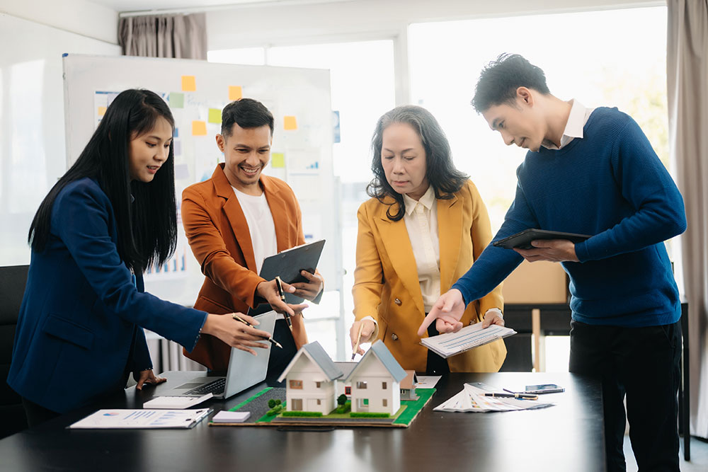 Staff discussing in a property management company