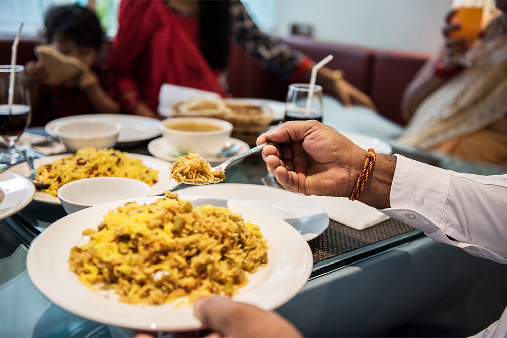 Family having Indian food