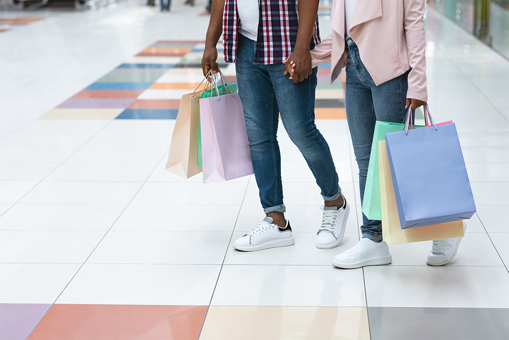 A couple enjoying shopping at Al Murad Mall in Ajman 