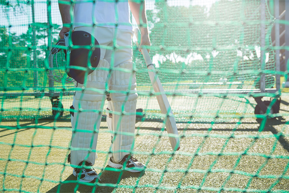 cricketer in an indoor cricket field in Sharjah