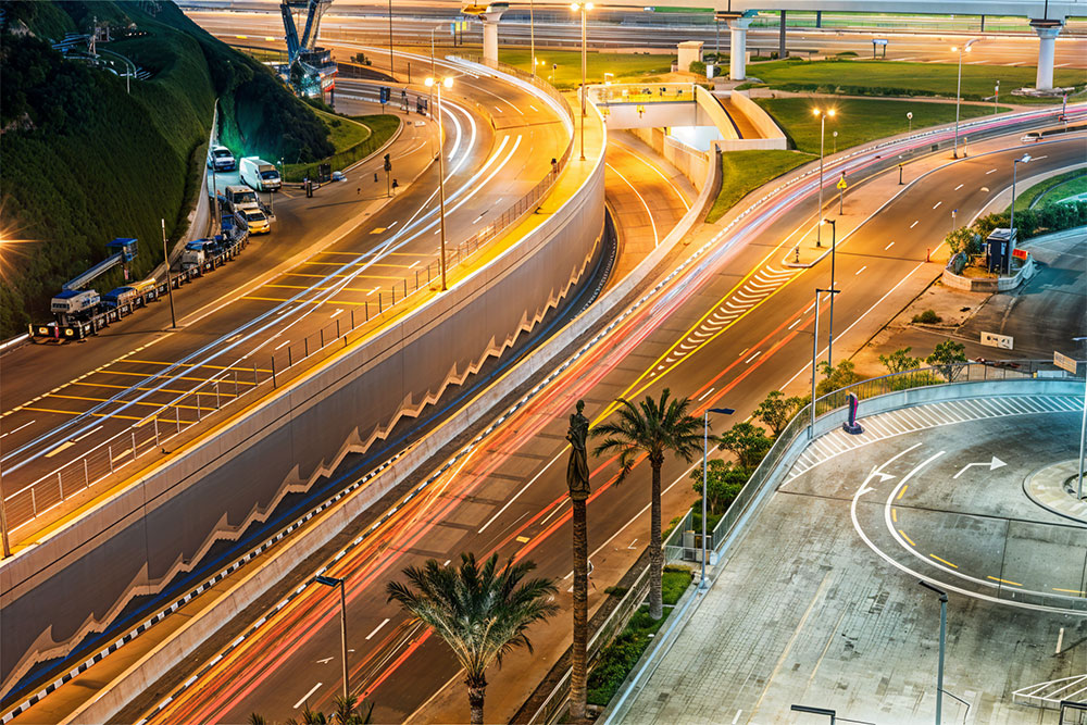 Road or street to Burj Khalifa in Dubai Downtown skyline and highway, United Arab Emirates or UAE.