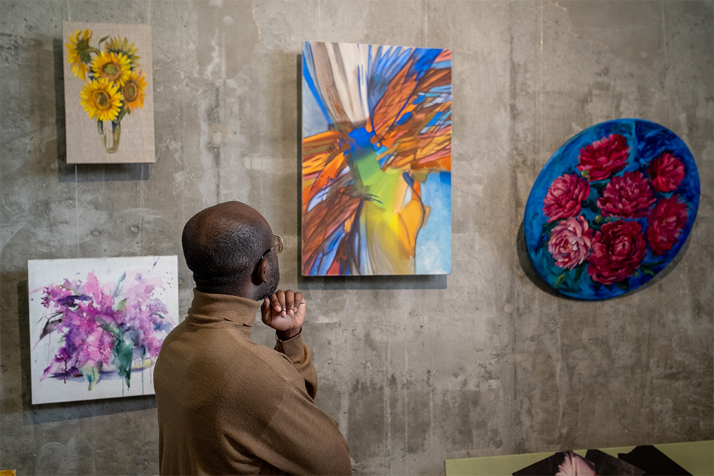 Couple exploring an art gallery 