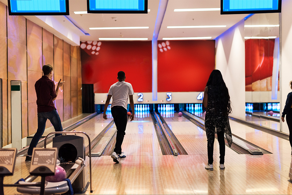 Friends at the bowling alley together