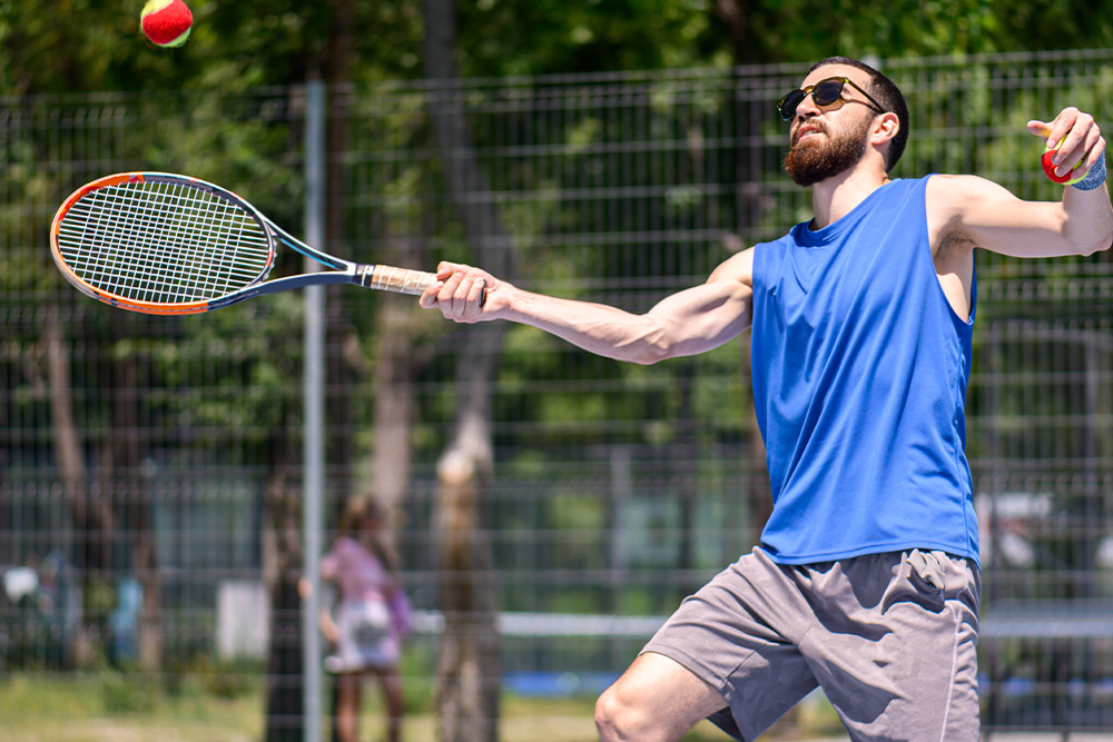 playing at the best tennis club in Dubai