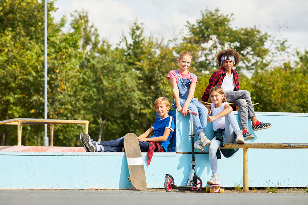  skateboards and bikes in the park