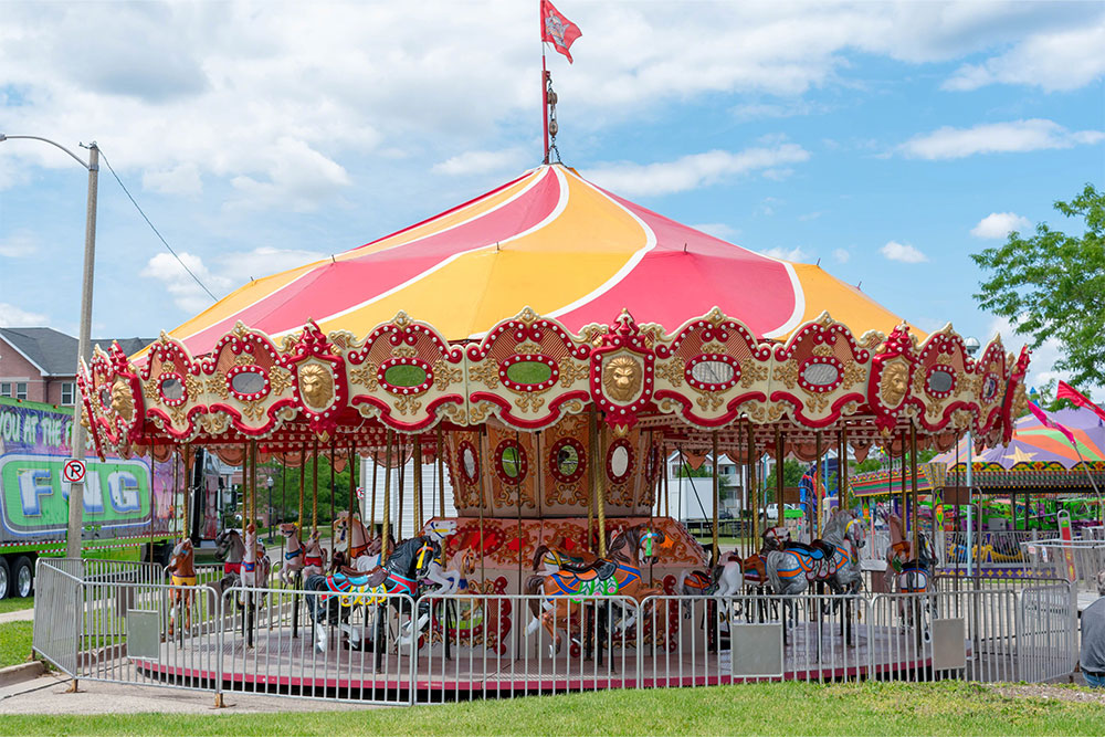 enjoying a delightful ride at the merry-go-round 